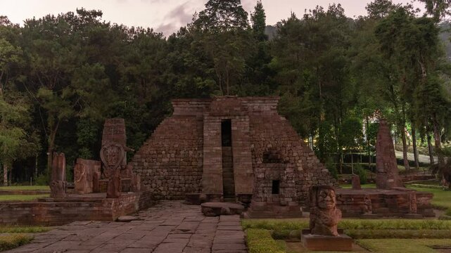 Time Lapse Candi Sukuh - 15th century Javanese Hindu Pyramidal temple in Central Java, Indonesia on the western slope of Mount Lawu with erotic art sculptures ruin