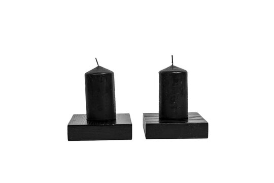 Two Black Candles on Minimalist Wooden Stand