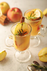 Warm apple autumn drink with cinnamon