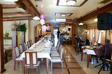 October 6, 2018. Belgrade, Serbia - Restaurant interior with pink and white balloons ready to host a celebration