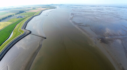 Aerial view of the tidal mudflats and channels of the Eemsdelta and Dollard, Groningen, The Netherlands
