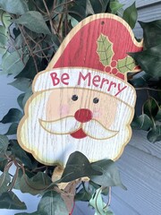 A Santa Claus face holiday decoration.