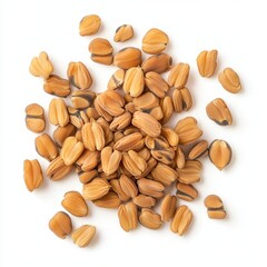 A pile of golden-brown seeds, varying in shape and size, showcasing their natural texture and color.