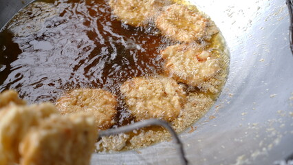 Street vendor of Pontianak fried bananas. Indonesia street food.