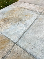 Obraz premium Repaired Cracks on Old Concrete Driveway