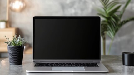 Fototapeta premium Sleek Silver Laptop on a Modern Desk, Perfect for Productivity