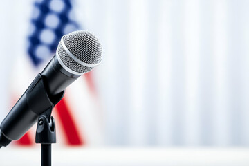 Fototapeta premium Close-up of microphone with flag backdrop.
