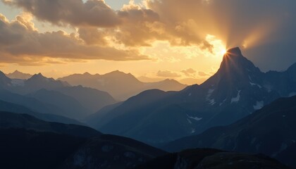 Obraz premium A stunning sunset over a mountain peak, casting dramatic rays of light through the clouds. This serene and majestic scene evokes a sense of awe and epiphany