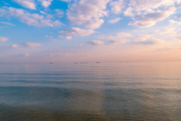 Fototapeta premium Sunset over the sea. Beautiful seascape. Evening twilight. Natural background.