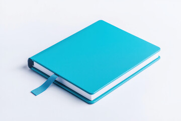 Fototapeta premium A vibrant turquoise notebook with a ribbon bookmark, ideal for organizing notes and ideas in a stylish manner. isolated on white background.