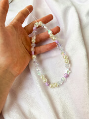 Handmade Pearl Bracelet Demonstrated by Little Girl