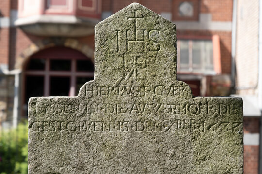 Old grave near church in Aubel-Belgium