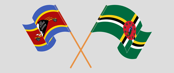 Crossed and waving flags of Eswatini and Dominica. Vector illustration