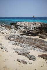 A Coastal Landscape Featuring Turquoise Waters and Rock Formations