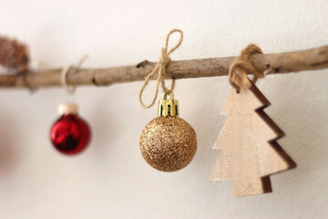 Cute Christmas tree ornaments, hanging on the branches. Selective focus. © jelena990