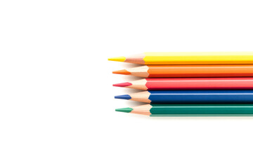 Fototapeta premium A vibrant assortment of colored pencils arranged neatly, showcasing a variety of colors against a clean, white background.