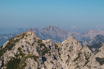 Scenic view of rugged mountain peak Piper seen from top of Jof di Miezegnot. Surrounded by majestic...
