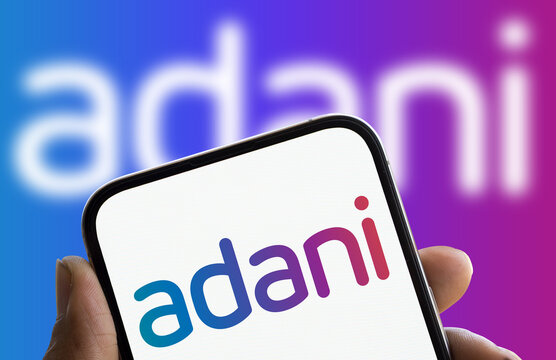 Dhaka, Bangladesh- 0 Dec 2024: Adani logo is displayed on smartphone. Adani Group is an Indian multinational company.