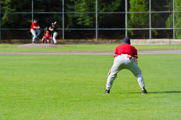Baseball players playing the sport they love at a small stadium of the minor leagues