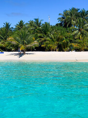 Amazing summer holiday vacation in Maafushi island, Maldives - amazing trip with beautiful blue sky and clear blue sea, with soft white sand 