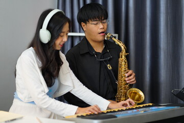 Working Asians are learning international musical skills at home