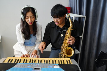 Working Asians are learning international musical skills at home