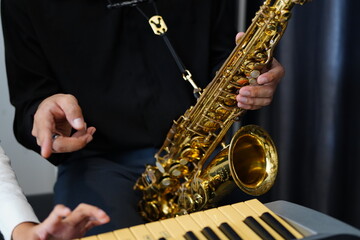 Working Asians are learning international musical skills at home