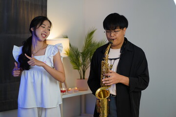 Working Asians are learning international musical skills at home