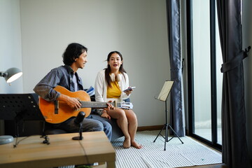 Working Asians are learning international musical skills at home