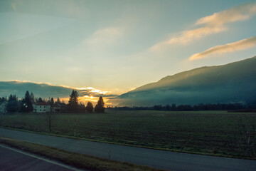 sunrise over the countryside mountains