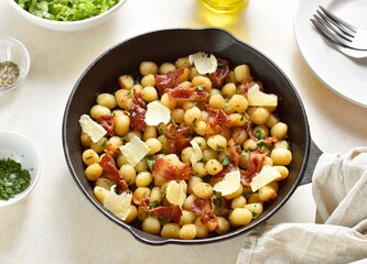 Potato gnocchi with bacon and parmesan cheese