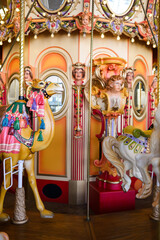 Beautiful carnival fair carousel with animals and yellow lights © Schaefer Photography