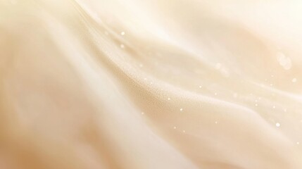 Beige-toned abstract background with soft fabric texture and subtle glittering effect