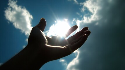 Close-up of hand holding hand outstretched to the sun, inciting composition, sun beyond hand, beautiful sky,