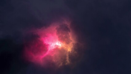 A glowing object floats against a dark backdrop, pulsing with color. Motion