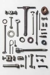 Assorted metal tools arranged neatly on white.