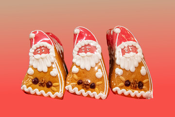 Three Santa Claus gingerbread figures