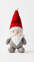 A whimsical Christmas gnome doll with a fluffy beard and vibrant red hat, perfect for festive decor and holiday spirit.