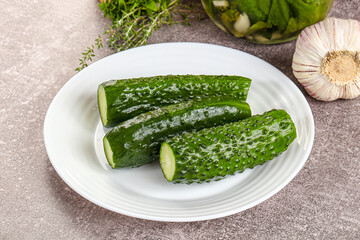 Homemade lighty salted cucumbers with herbs