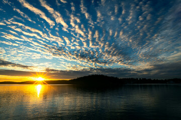 Sunrise sunburst on ocean