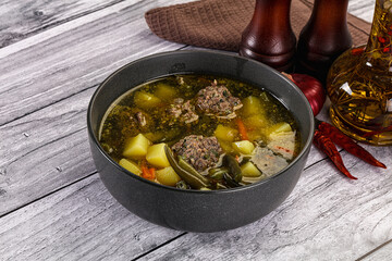 Soup with beef meatballs and vegetables