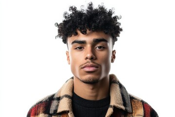 Obraz premium Confident Young Man with Curly Hair in Stylish Plaid Jacket Against White Background