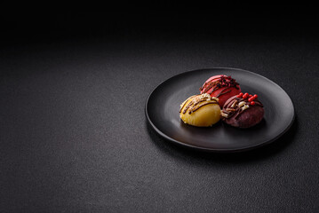 Delicious colorful asian mochi sweets with rice dough shell and fruit filling