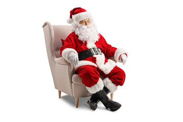 Santa claus sitting in an armchair