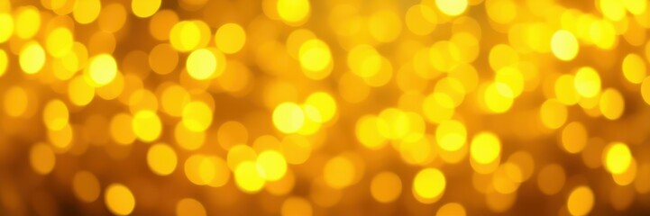 Obraz premium Bright golden bokeh effect creating a warm and inviting atmosphere during a festive evening celebration