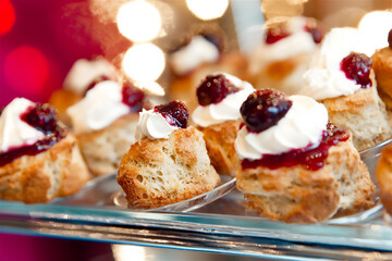 a tray of festive holiday scones topped with