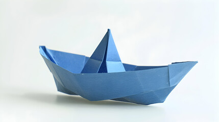 Obraz premium Blue paper boat on light surface on white background
