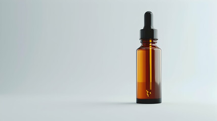 Studio shot of serum in bottle with dropper isolated on white