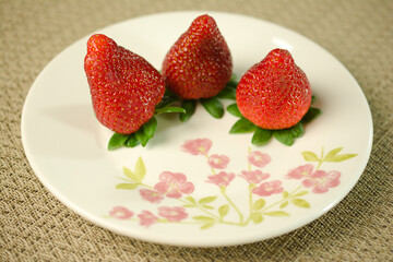 Artistic Trio of Fresh Strawberries