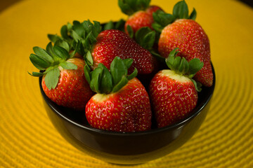 Fresh Strawberries in Black Bowl